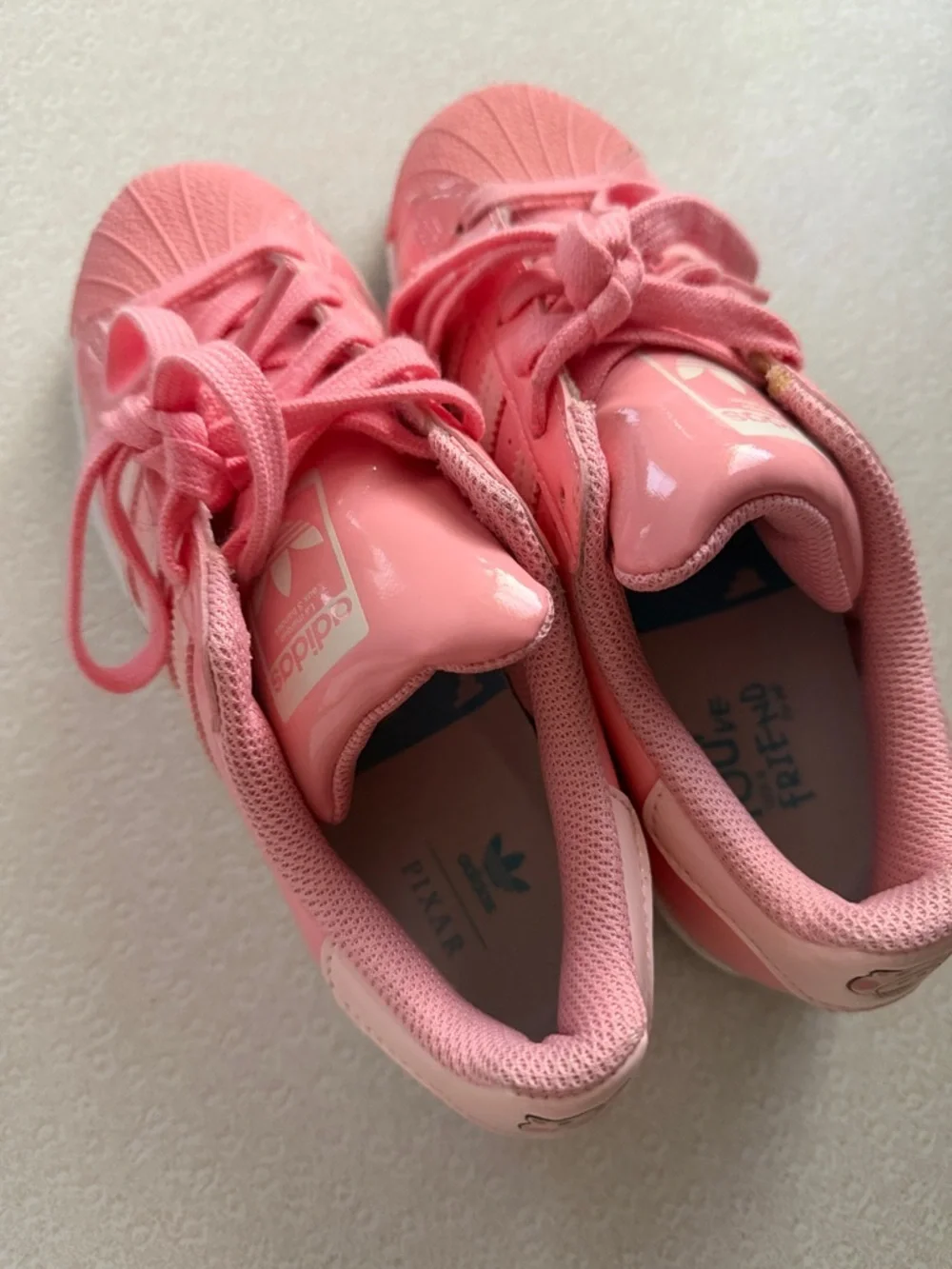 adidas Toy Story Pink Patent Shell-Toe Sneakers